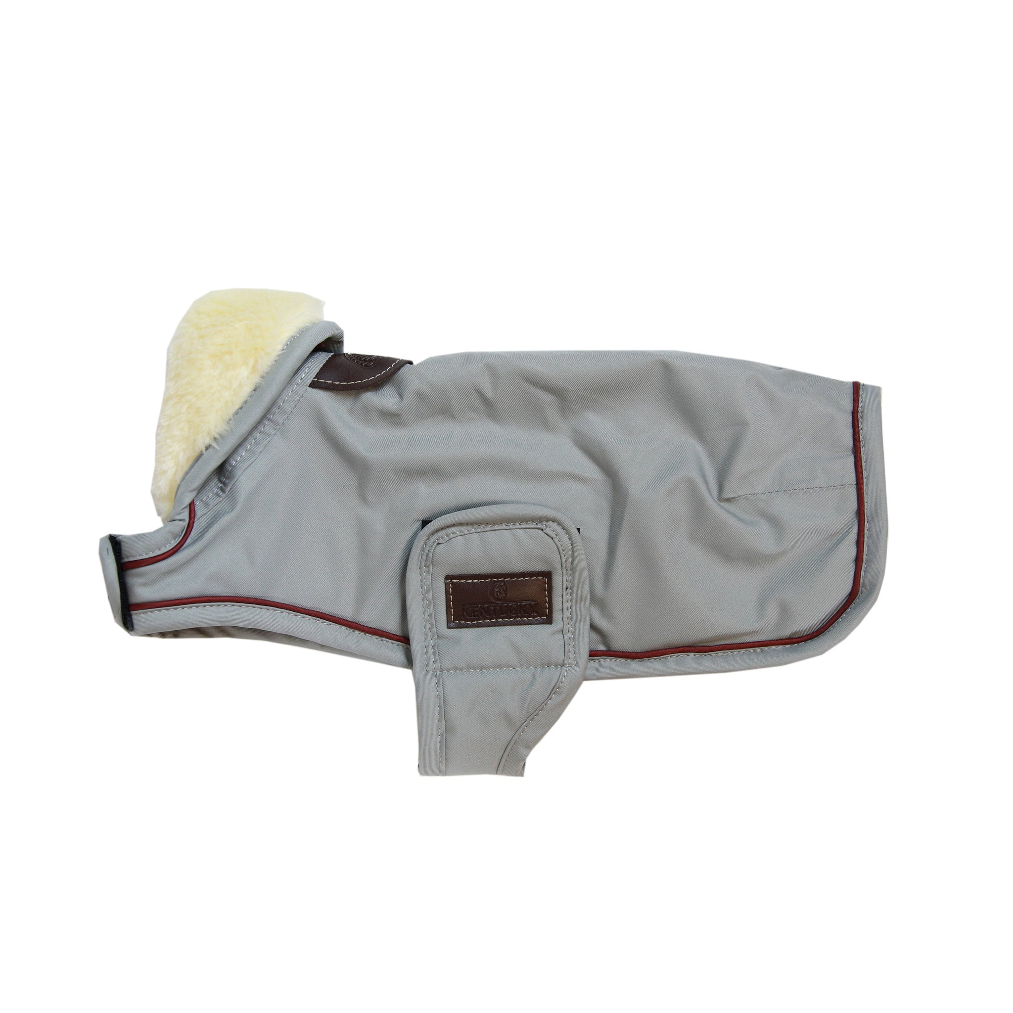 The Kentucky Grey Waterproof Dog Coat  offers every dog a dry, warm rug during the cold and wet winter days. Filled with a warming 160g and also featuring an artificial faux fur lining for extra comfort. This also creates tiny air pockets that trap and retain the body heat of the dog.