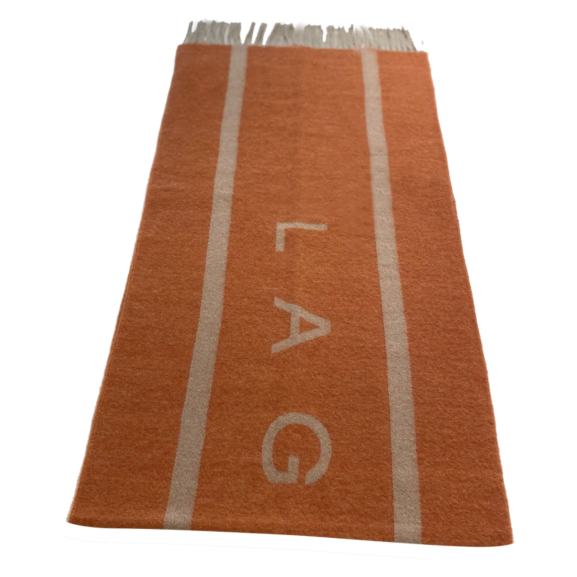Laguso Signature orange scarf is the perfect accompaniment this season. The scarf is oversized and has a reversable design to give you maximum style options.   Machine washable at 30’c