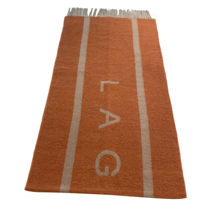 Laguso Signature orange scarf is the perfect accompaniment this season. The scarf is oversized and has a reversable design to give you maximum style options.   Machine washable at 30’c