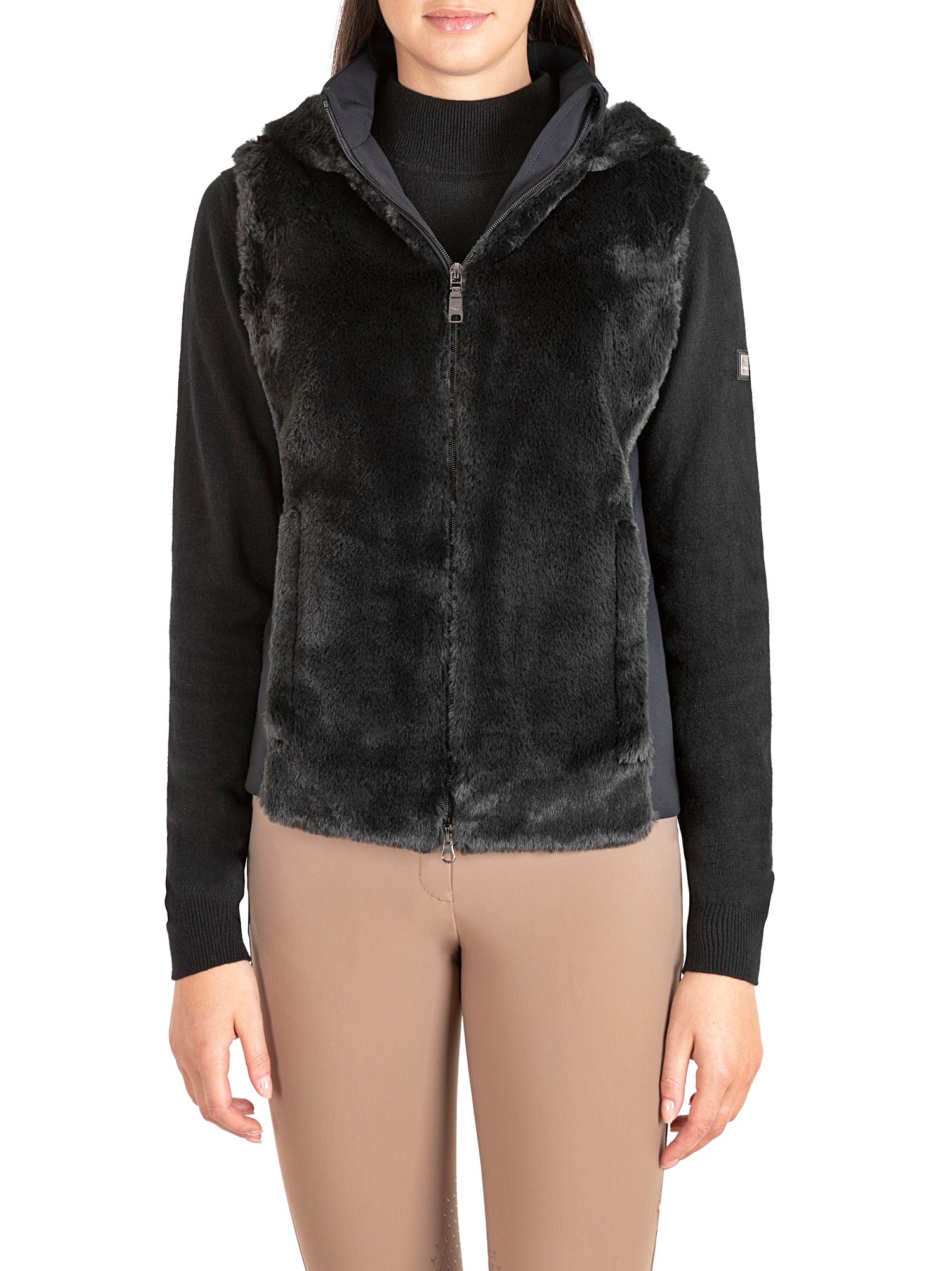 The Equiline Ezimie eco faux fur gilet has a sumptuous fur front and hood. The back if the gilet is made from a luxury bi stretch fabric creating a superb fit and maximum movement. For added luxury the gilet if fully lined in a fine bi stretch jersey.  I must have for this Autumn.