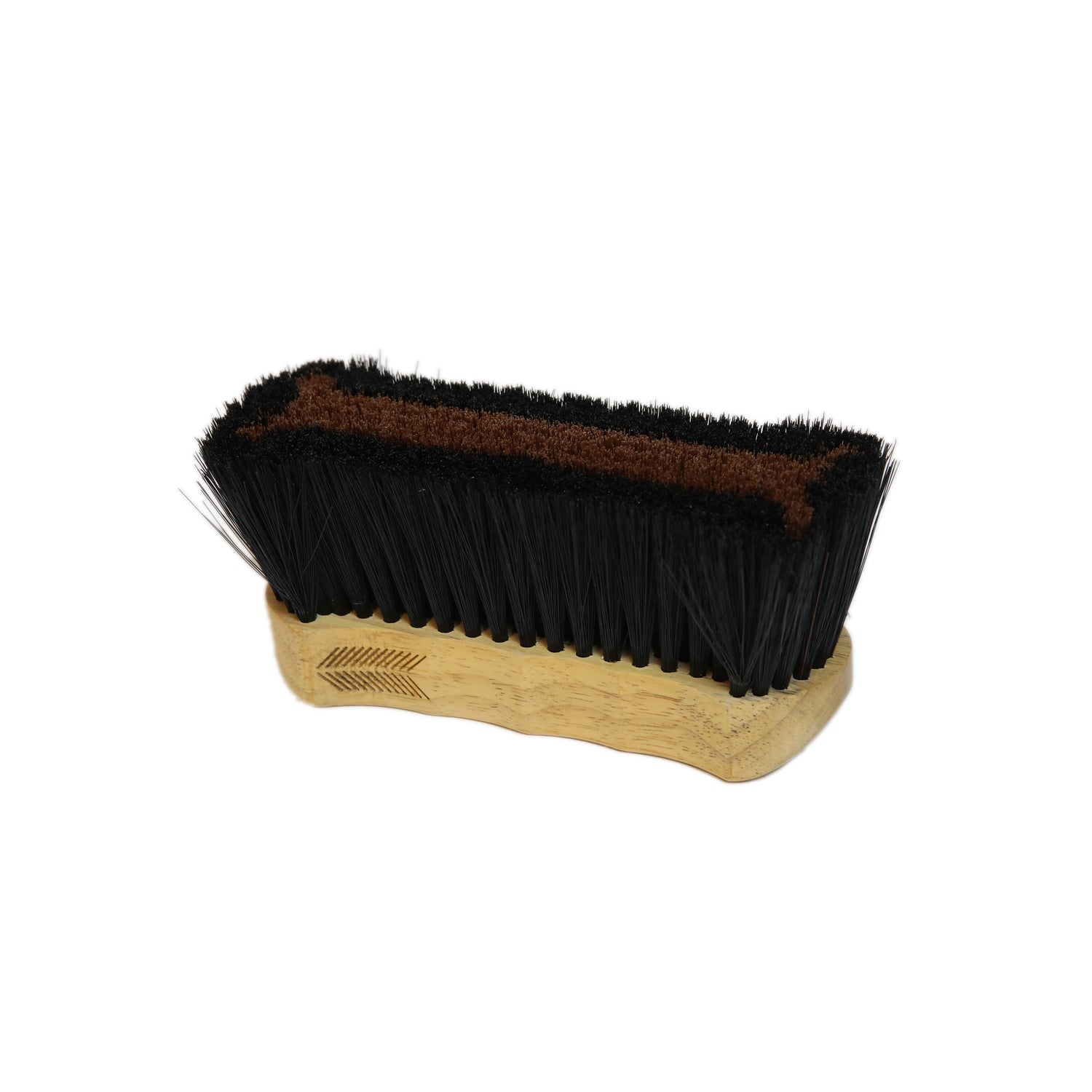 The Kentucky body brush. The outer if the brush is made with brown bristles to help remove the dirt and hairs that has been loosened up. The polypropylene bristles are hard, ideal to use in the winter, when the coat is thicker, or on a muddy horse. The brown bristles in the centre are also smoother, for a better action of the brush. Clean your brush by damping it into soapy warm water and make sure it lasts for a long time.